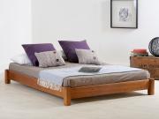 low wooden platform bed without headboard