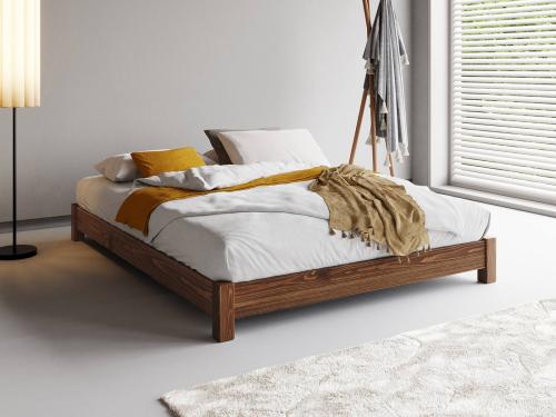 low wooden platform bed in coffee bean